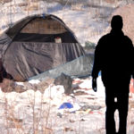 Picture of man's outline and homeless man's tent